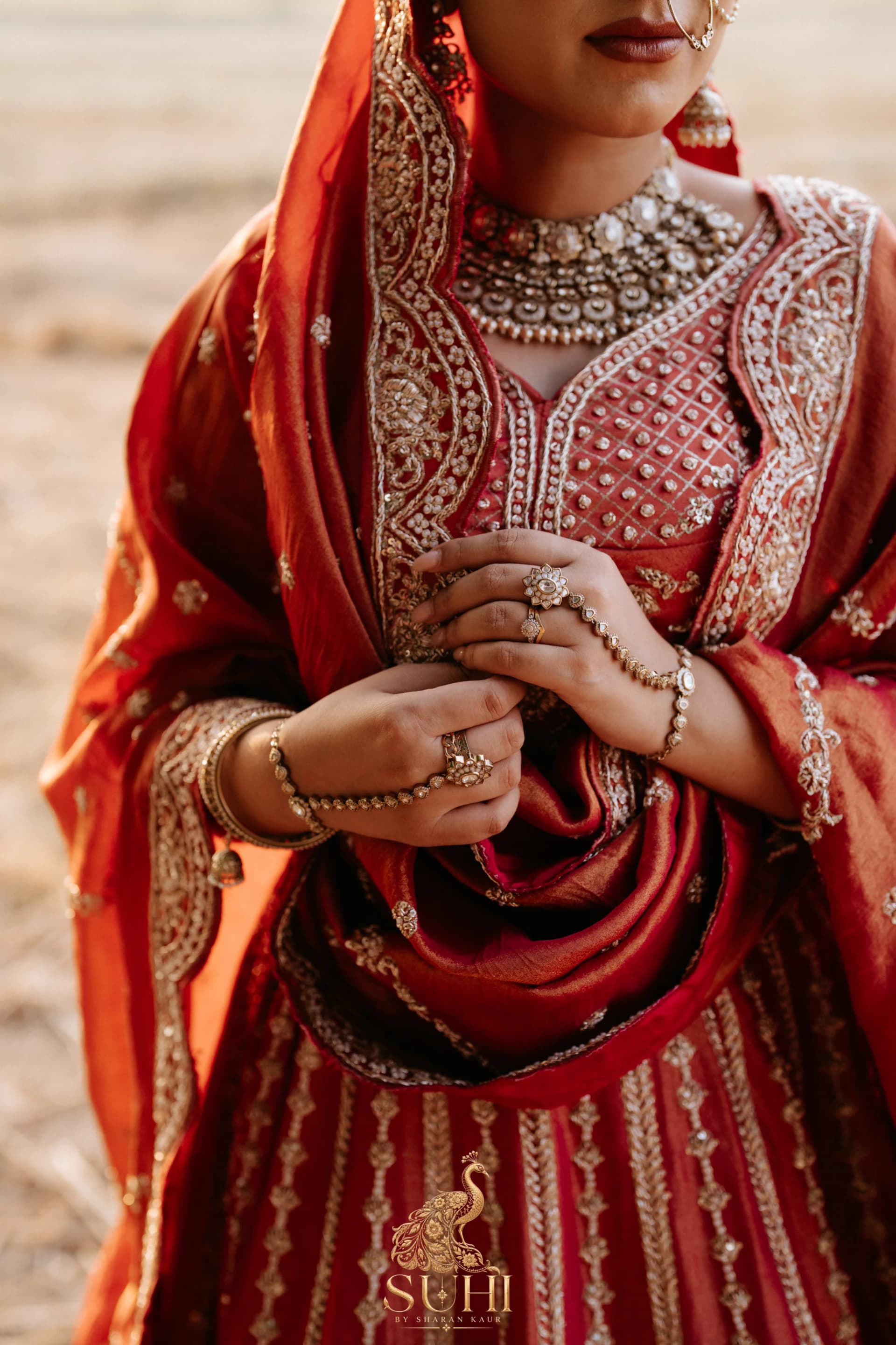 Intricate golden hand embroidery across the MEHRUNISA neckline and blouse
